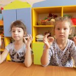 Children perform kinesiological gymnastics